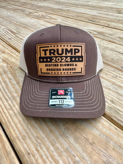 Trump Beating Clowns and Dodging Rounds Leather Patch Hat